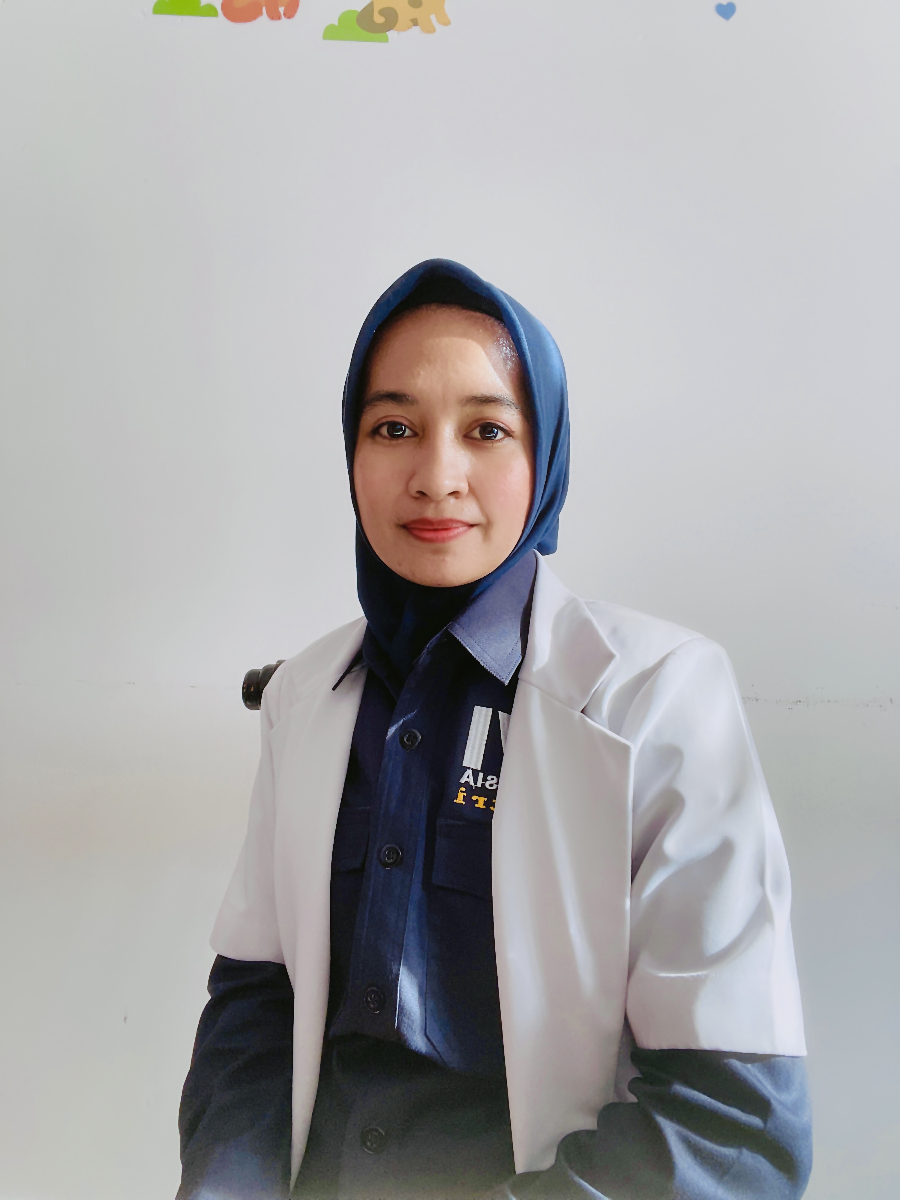 dr. Shafni Fitri, M.kes